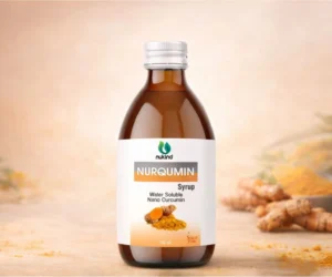Front view of Nurqumin water soluble nano curcumin syrup packaging with turmeric visual.